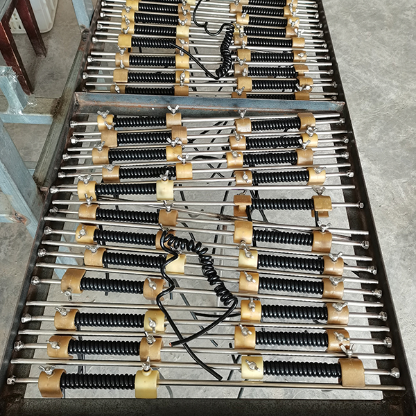 Spring connecting cable production